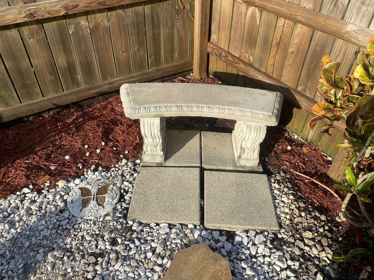 Garden bench and stone pad, cleaned in place